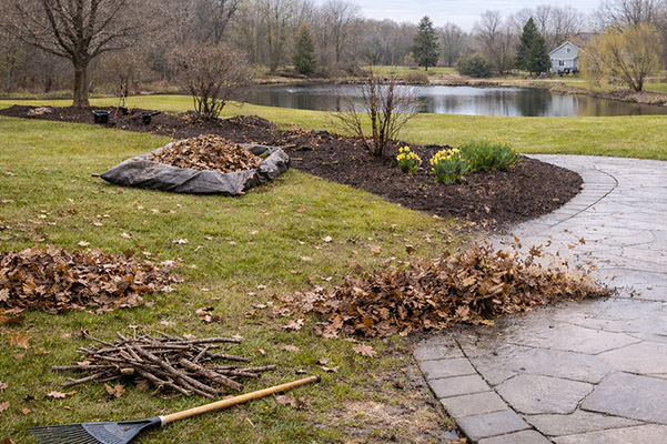 Spring landscape cleanup work on a residential or commercial property in Southeast Michigan.